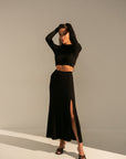 PLEATED SKIRT WITH A SLIT BLACK